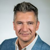 Professional headshot of Alexis Estevez, Realtor based in Pasadena, helping San Gabriel Valley families navigate move-up decisions with clarity and long-term strategy.